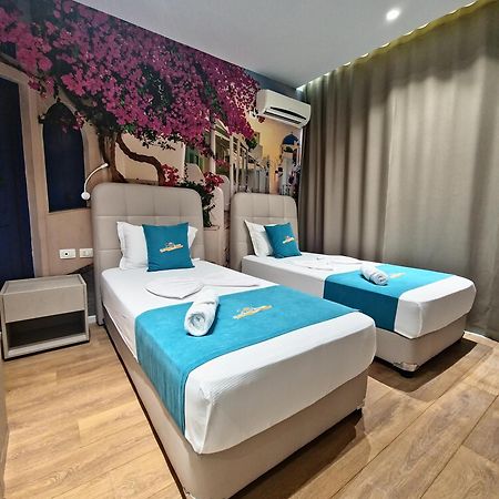 Suncoast Rooms Port Side ساراندا المظهر الخارجي الصورة